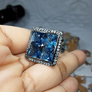 925 blue topaz ring.